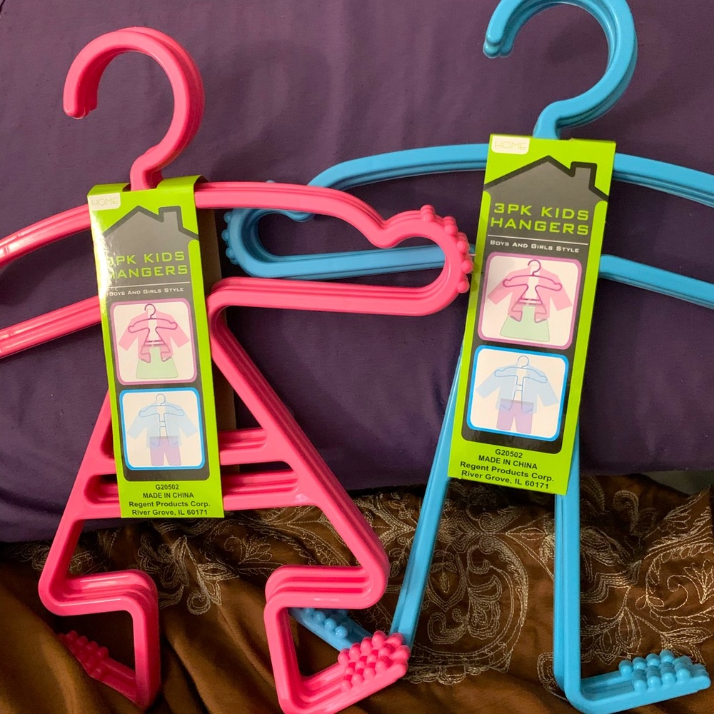 2 - 3 pack kid clothes hangers. 1 Pink pack,                        1 Blue pack.